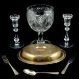Four Waterford candlesticks, an oversize goblet/bowl, plated flatware and entree dishes.