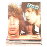 Sixteen LP vinyl music records, including the Rolling Stones, Billy Joel, UB40 etc.