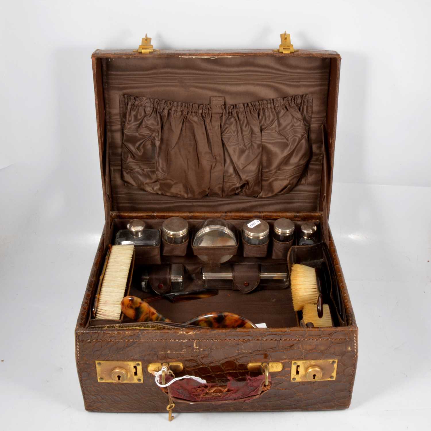 Victorian leather travelling case, silver mounted fitments,