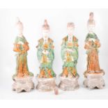 Two pairs of Chinese earthenware tomb attendant figures,