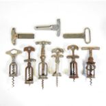 Six Continental corkscrews and three cork pullers,