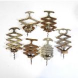 Six French concertina corkscrews,