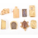 Eight brass vesta cases,