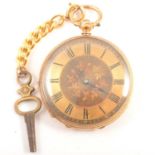 A yellow metal fob watch.