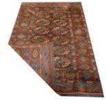 Persian silk rug and an Afghan rug,