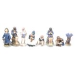 Eight Royal Copenhagen porcelain figures,