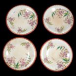 Set of four Minton pottery low comports or dessert stands