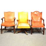 Two George III style Gainsborough chairs and a similar swivel chair