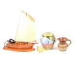 A vintage wooden boat design lamp, ceramics.