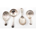 Four silver caddy spoons,