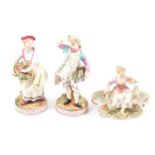 Meissen porcelain table salt and a pair of Dresden figures,