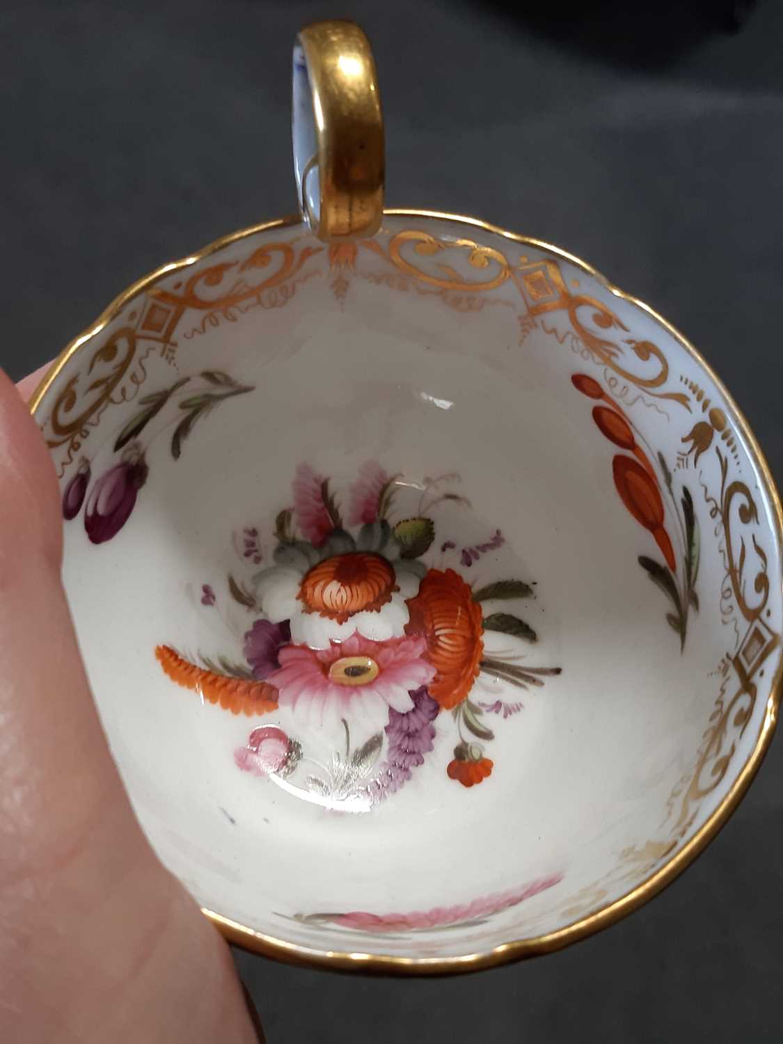 Continental fairing group, teacup and saucer, four millefiore paperweights, - Image 6 of 7