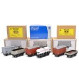 Six O gauge model railway freight cars