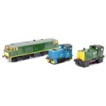 Three O gauge model railway diesel locomotives
