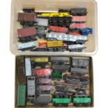 Two trays of O gauge model railway rolling stock