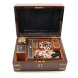 A mahogany travelling case with costume jewellery, crotchet and tatting work.