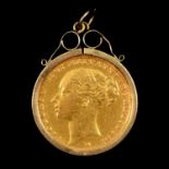 A Gold Full Sovereign Coin pendant.