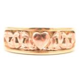 A Clogau Welsh gold “Cariad” ring.