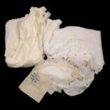 A quantity of vintage linen and lace.