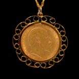 A Gold Full Sovereign Coin pendant and chain.