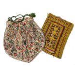 An Indian silk embroidered Indian drawstring bag, and a Kashmir Baluch bag