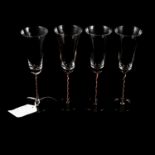 Set of four Murano champagne flutes,