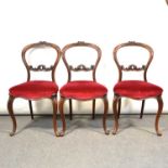 Set of six Victorian carved walnut balloon-back chairs,