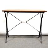 Cast iron table with a mahogany top,