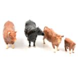 Four Beswick pottery cattle models,