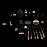 A collection silver and white metal items,