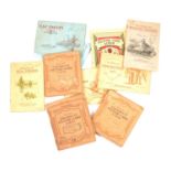 Collection of cigarette cards, mostly in albums.