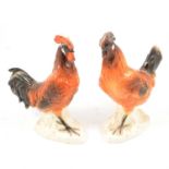 Lladro porcelain and a pair of pottery hens,