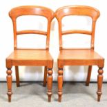 Pair of Victorian oak hall chairs,