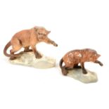 Two Beswick pottery panther models,