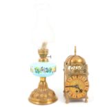 Brass cased lantern clock, and a Victorian oil lamp