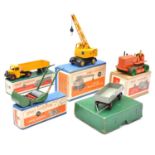 Dinky Toys die-cast models, five boxed examples.