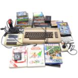 Commodore 64 computer, joysticks; cassette loader; selection of software and games.