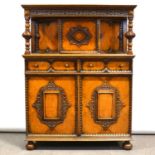 Golden oak court cupboard, Maple & Co