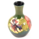 Moorcroft Pottery, a 'Hibiscus' design vase, circa 1950