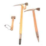 Two ice axes and a climbing hammer