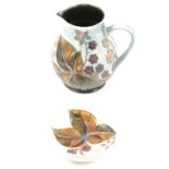 Moorcroft Pottery, two 'Bramble' design items designed by Sally Tuffin
