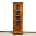 Walnut freestanding corner cupboard, off small size, glazed door over two drawers.