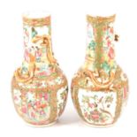 Pair of Cantonese vases with dragons to the necks