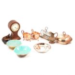 A balloon shaped mantel clock, silver-plated wares, two oriental dishes.
