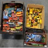 Three boxes of die-cast model construction vehicles, aircraft and trucks