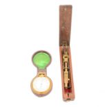 Pocket barometer, cased and a set of folding scales,