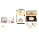 Gold half Sovereign coin and other coins,