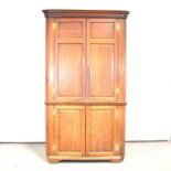 George III oak freestanding corner cupboard,