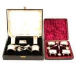 Set of four silver salts, cased and a part silver condiment set,