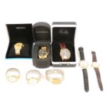 Eight gentlemen's gold-plated wristwatches and some spare straps.